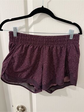 Athleta Mesh Racer Run Short 4”, size small, purple speckled print